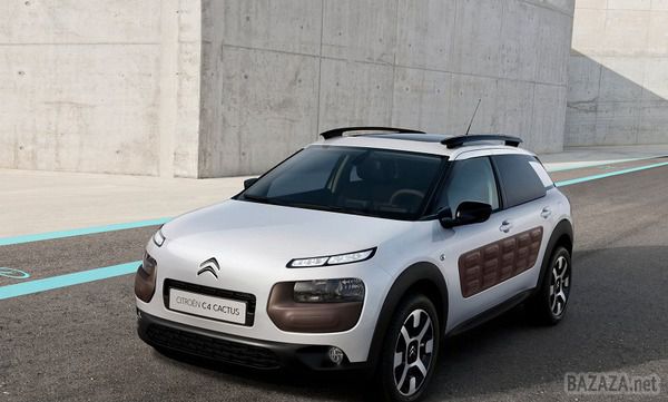 Citroen C4 Cactus став серійним (Фото). Новий кросовер оснащений панорамним дахом з підвищеним ступенем захисту від ультрафіолетових променів , а форсунки омивача лобового скла тут розміщені безпосередньо на « двірниках »