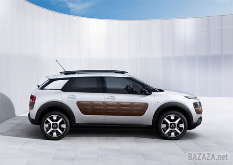 Citroen C4 Cactus став серійним (Фото). Новий кросовер оснащений панорамним дахом з підвищеним ступенем захисту від ультрафіолетових променів , а форсунки омивача лобового скла тут розміщені безпосередньо на « двірниках »