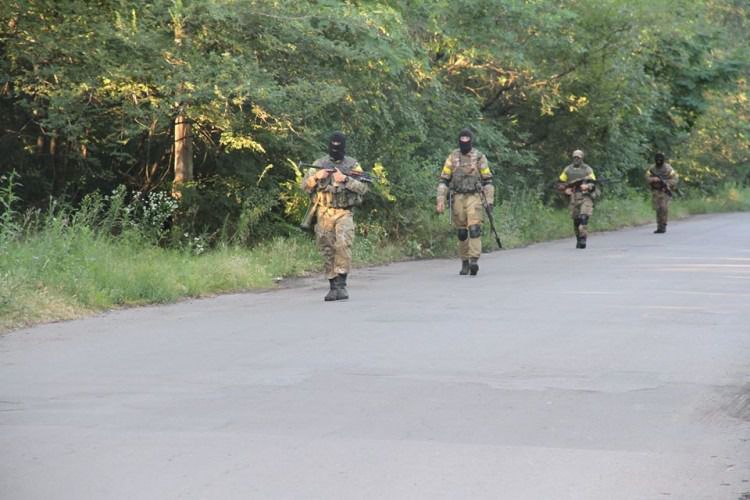 У штабі АТО підтверджують відступ українських військових в Росію. Кількість українських військовослужбовців в РФ уточнюється