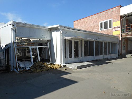 Луганськ зруйнований. Фото. 21.09.2014. Станом на ранок 21 вересня в Луганську спокійно. Ніч пройшла тихо. В місті ще зберігаються проблеми зі зв'язком, електроенергією, водою.