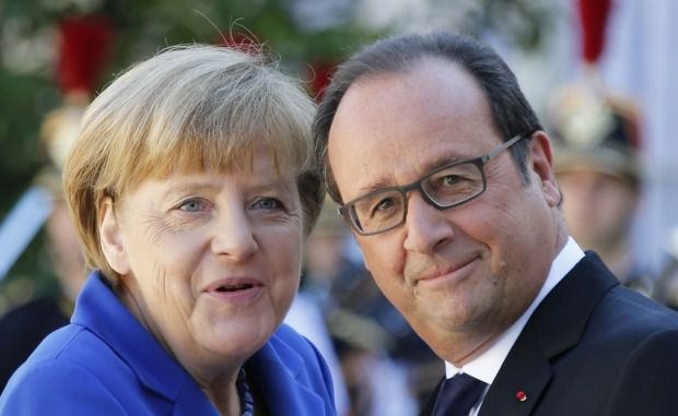 Тепер є не тільки мінські, але і паризькі гарантії - Меркель. В ході переговорів "нормандської четвірці" були досягнуті паризькі домовленості.
