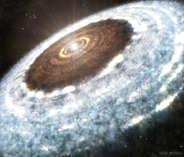 Астрономи вперше виявили "лінію снігу" біля молодої зірки. Виявлене "кільце" знаходиться від зорі на відстані, що дорівнює шляху від Сонця до Плутона
