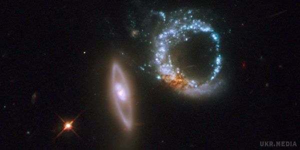 NASA показало дивовижний знімок подвійної галактики. Американське космічне агентство NASA показало дивовижний знімок подвійної галактики IRAS 06067-2139.