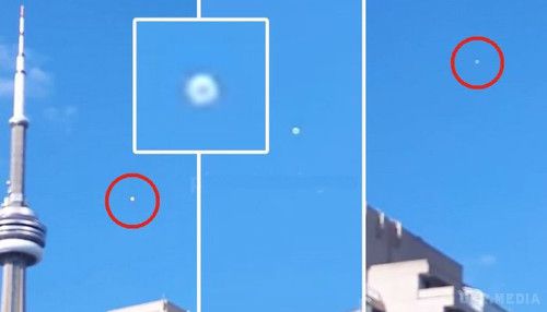 НЛО над Торонто (відео). Блискучий круглий об'єкт, летів на рівні оглядового майданчика на башті, яка знаходиться на висоті 350 метрів.