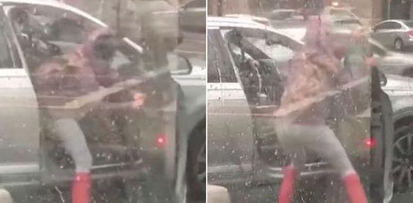 У Мережі набирає популярність відео битви дівчини за двері автомобіля (відео). Дівчина вступила в бій зі штормом за двері автомобіля.