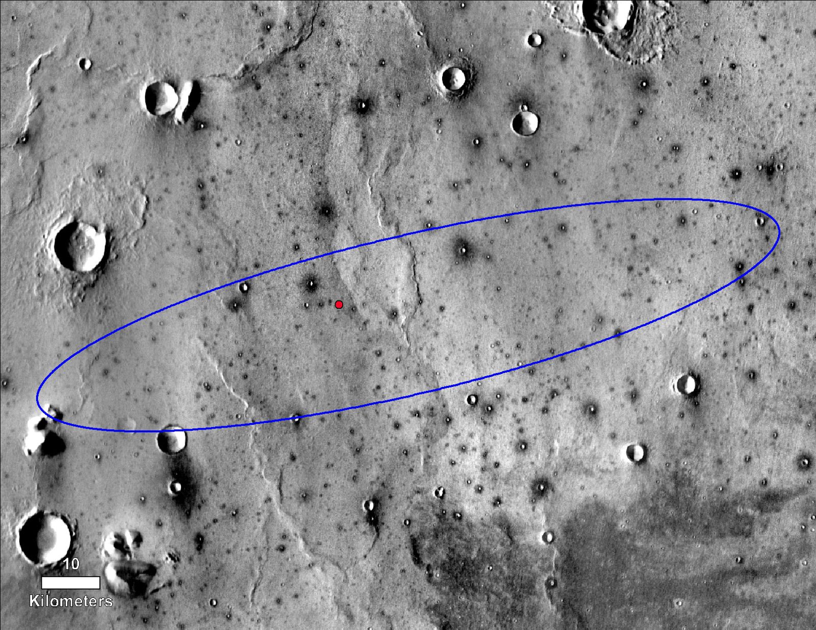 Місцерозташування зонду InSight розгледіли з орбіти. Орбітальний апарат Mars Reconnaissance Orbiter зміг сфотографувати посадочну платформу місії InSight, теплозахисний екран і парашут.