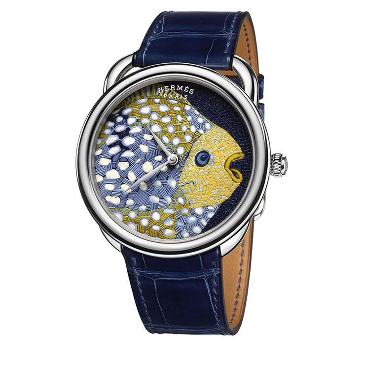 Hermes створили годинники з візерунком хустки-каре. Екзотична рибка в «акваріумі» з білого золота.