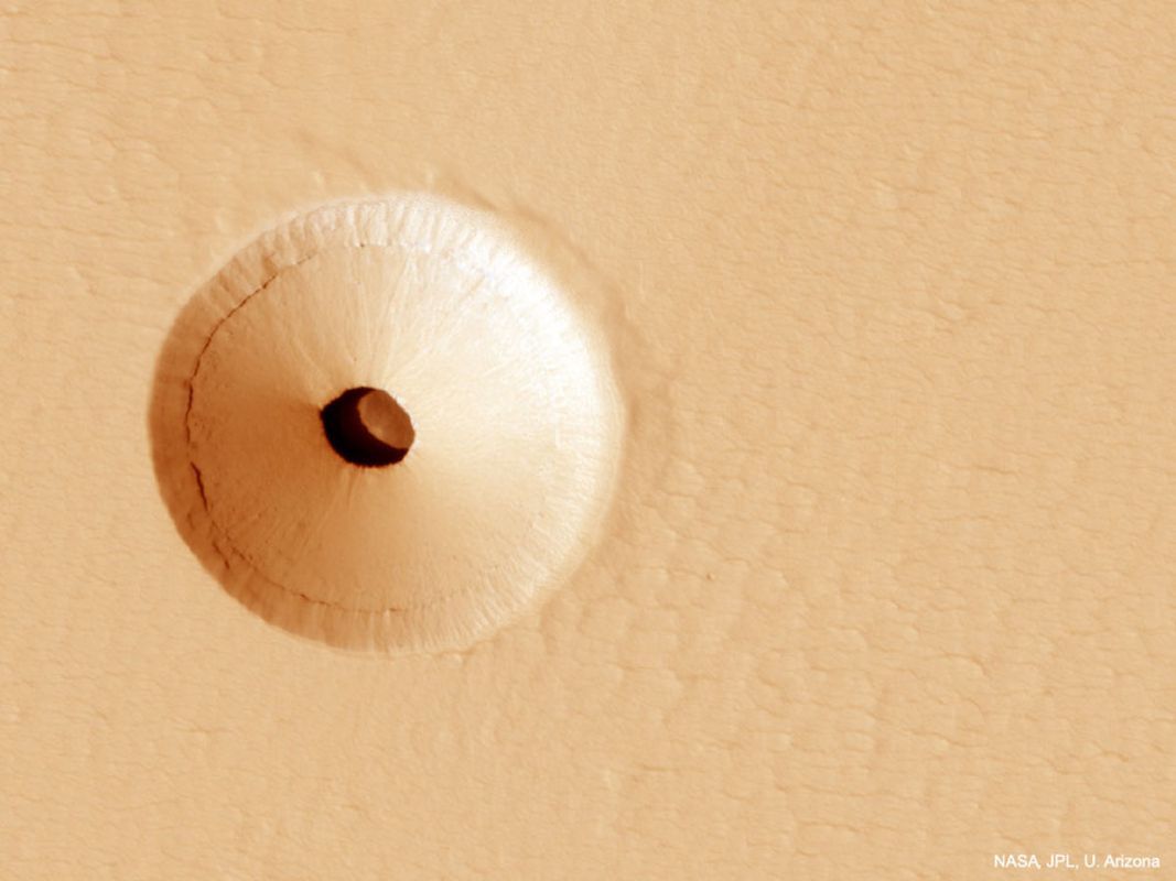 Вчені знайшли на Марсі загадкову діру, яка може бути потенційно населеною. Можливо, це вхід в печеру.