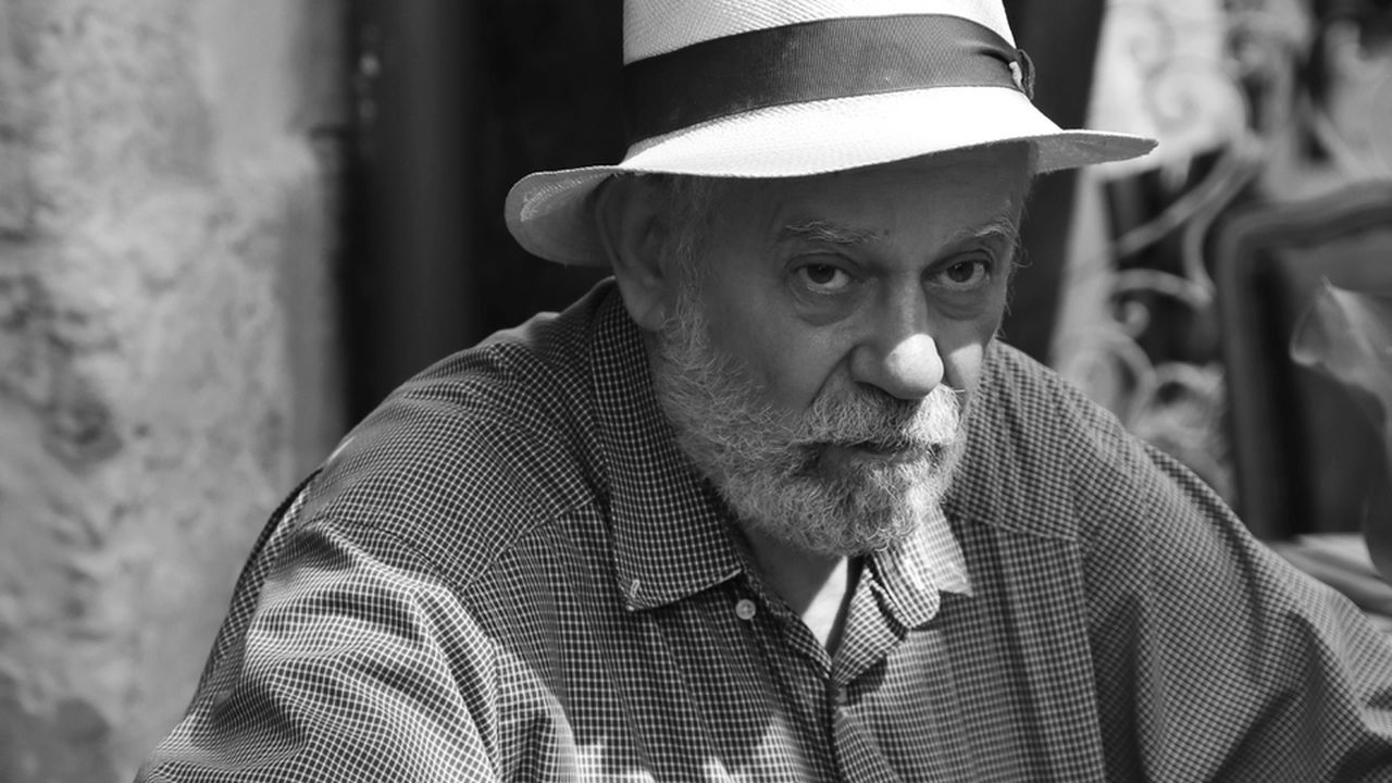 Портрет мудрого чоловіка у капелюсі.